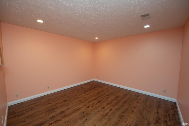 3827 Sunnycroft Pl, West Lafayette, IN 47906 - unfurnished room featuring dark wood finished floors, recessed lighting, and a textured ceiling