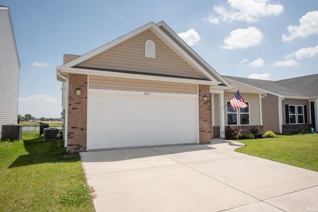 6471 Wallingford St, Lafayette, IN 47905 - ranch-style home with brick siding, driveway, and a garage
