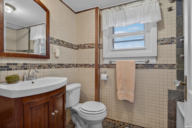 412 Tonti Ave, South Bend, IN 46617 - bathroom with tile walls, vanity, curtained shower, and tile patterned floors