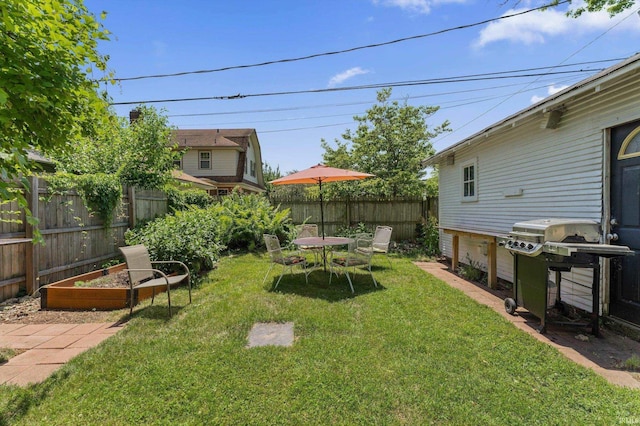 412 Tonti Ave, South Bend, IN 46617 - fenced backyard with a garden
