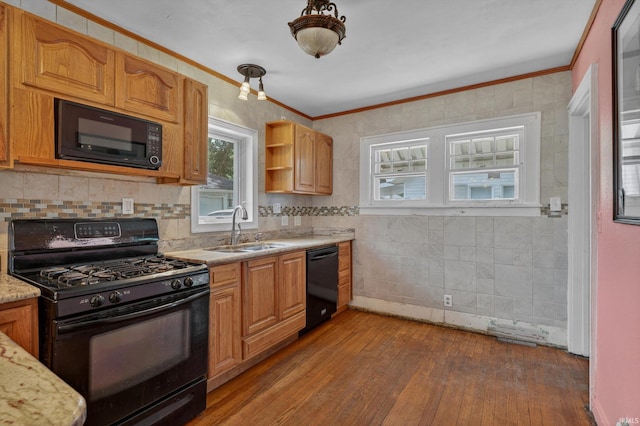 412 Tonti Ave, South Bend, IN 46617 - kitchen featuring black appliances, hardwood / wood-style flooring, ornamental molding, open shelves, and backsplash