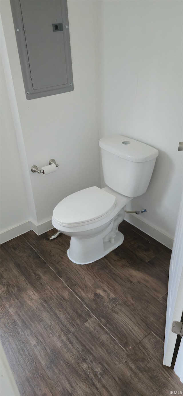 589 Graves Addn Rd, Bedford, IN 47421 - bathroom featuring electric panel and wood finished floors