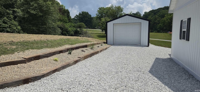 589 Graves Addn Rd, Bedford, IN 47421 - detached garage featuring gravel driveway