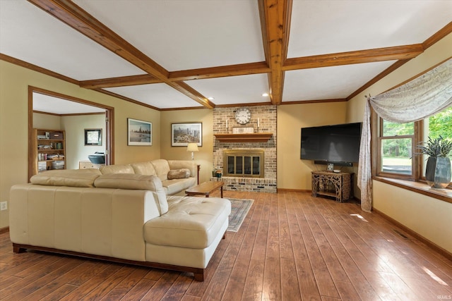 51769 S Saddle Ridge Ln, Granger, IN 46530 - living room featuring dark wood-style flooring, beamed ceiling, coffered ceiling, and a brick fireplace
