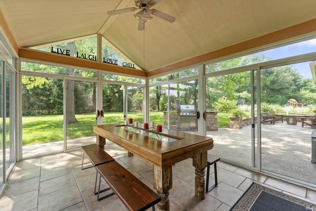 51769 S Saddle Ridge Ln, Granger, IN 46530 - sunroom featuring ceiling fan, lofted ceiling, exterior kitchen, and outdoor dining space