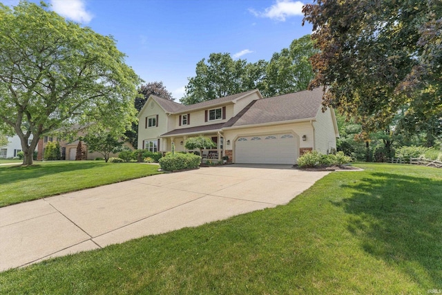 51769 S Saddle Ridge Ln, Granger, IN 46530 - traditional-style home with an attached garage, concrete driveway, and a front lawn