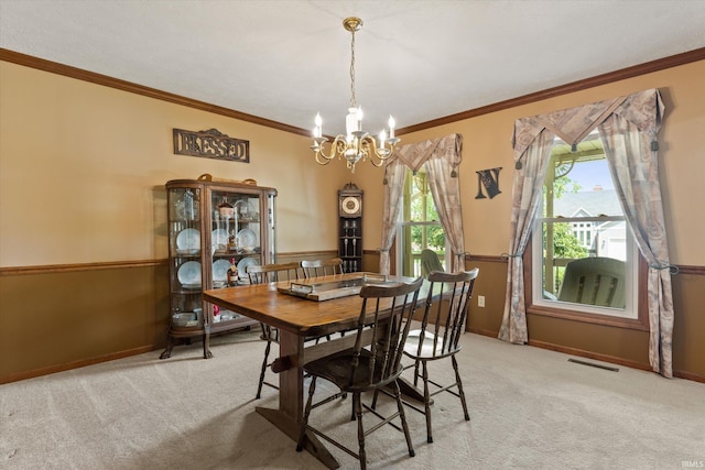 51769 S Saddle Ridge Ln, Granger, IN 46530 - dining space with a chandelier, light colored carpet, and crown molding