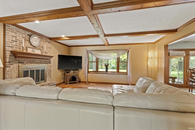 51769 S Saddle Ridge Ln, Granger, IN 46530 - living area with plenty of natural light, coffered ceiling, beam ceiling, a fireplace, and wood finished floors