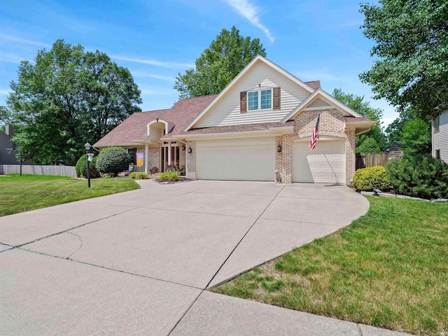 6709 Shag Bark Ct, Fort Wayne, IN 46835 - traditional-style home with brick siding, driveway, and a garage
