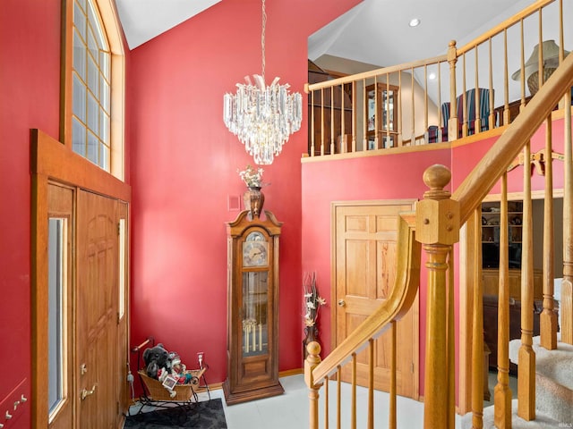 6709 Shag Bark Ct, Fort Wayne, IN 46835 - entrance foyer with a towering ceiling, a chandelier, and stairs