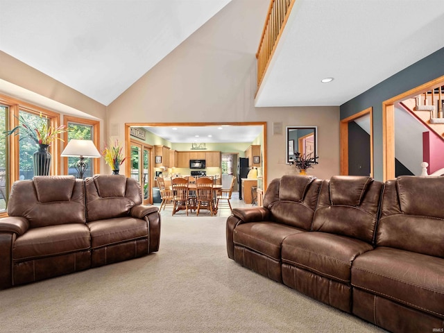 6709 Shag Bark Ct, Fort Wayne, IN 46835 - carpeted living area featuring stairs, high vaulted ceiling, and recessed lighting
