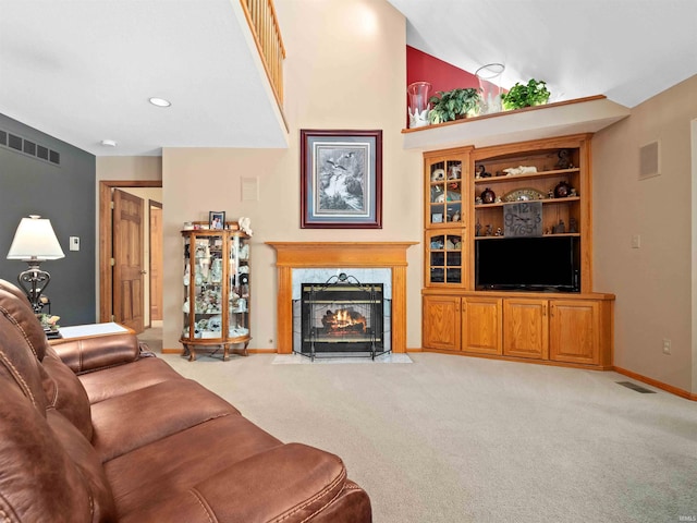 6709 Shag Bark Ct, Fort Wayne, IN 46835 - living room with light colored carpet, a fireplace, and a towering ceiling