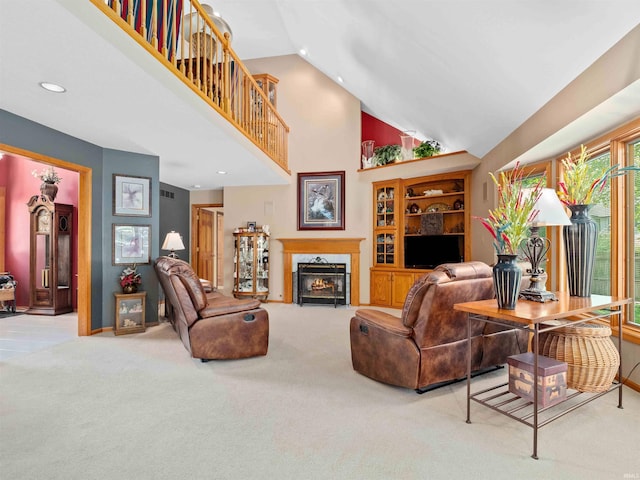 6709 Shag Bark Ct, Fort Wayne, IN 46835 - living area with carpet flooring, built in features, a premium fireplace, recessed lighting, and high vaulted ceiling