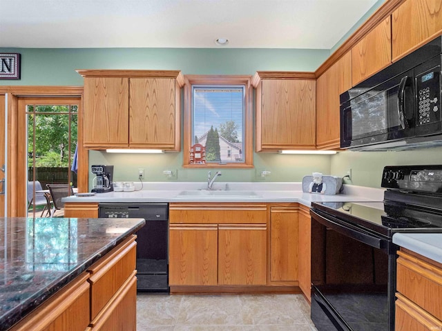 6709 Shag Bark Ct, Fort Wayne, IN 46835 - kitchen with black appliances and a sink