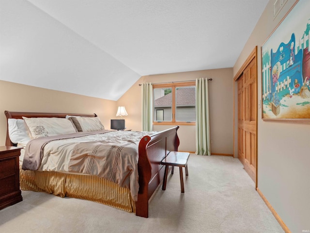 6709 Shag Bark Ct, Fort Wayne, IN 46835 - bedroom featuring light colored carpet, lofted ceiling, and a closet