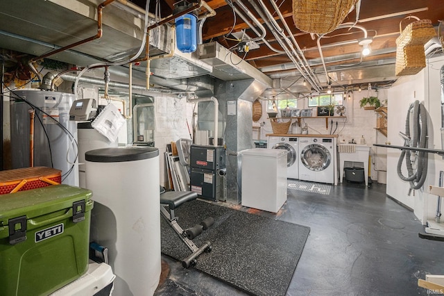1521 E Beardsley Ave, Elkhart, IN 46514 - below grade area featuring separate washer and dryer, water heater, a water softener system, and heating unit