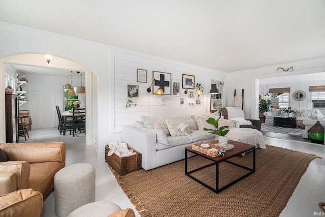 1521 E Beardsley Ave, Elkhart, IN 46514 - living room with arched walkways and healthy amount of natural light