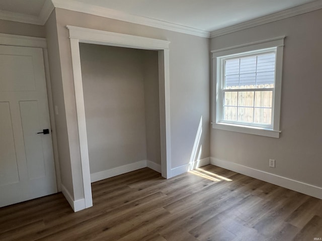 1503 W Ave, Goshen, IN 46526 - unfurnished bedroom featuring ornamental molding and wood finished floors