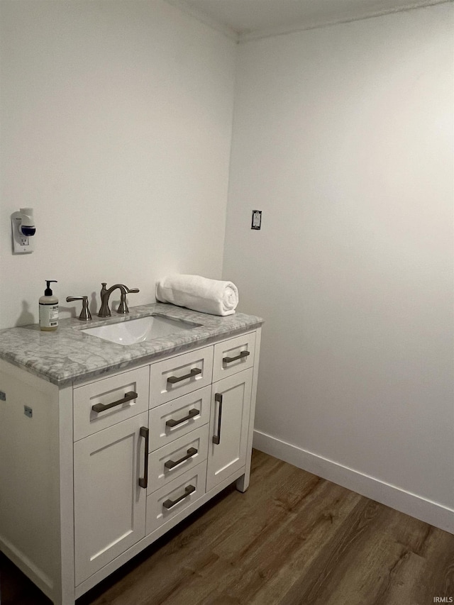 1503 W Ave, Goshen, IN 46526 - bathroom featuring wood finished floors and vanity