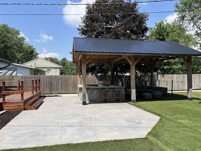 1503 W Ave, Goshen, IN 46526 - fenced backyard featuring a patio area, a gazebo, area for grilling, and a wooden deck