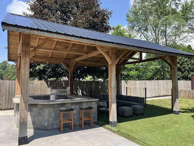 1503 W Ave, Goshen, IN 46526 - fenced backyard featuring a gazebo, a patio area, and area for grilling