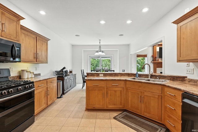 1208 Phaeton Way, Auburn, IN 46706 - kitchen featuring black appliances, recessed lighting, light tile patterned floors, brown cabinetry, and a peninsula