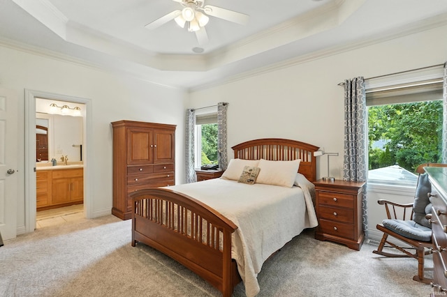 1208 Phaeton Way, Auburn, IN 46706 - bedroom with a raised ceiling, light colored carpet, crown molding, ensuite bath, and ceiling fan