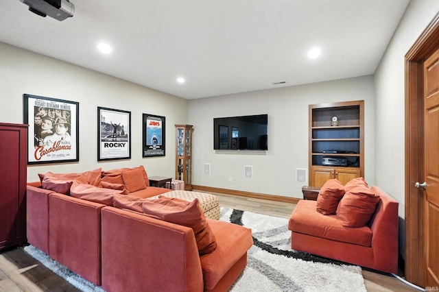 1208 Phaeton Way, Auburn, IN 46706 - living room with light wood-style floors and recessed lighting