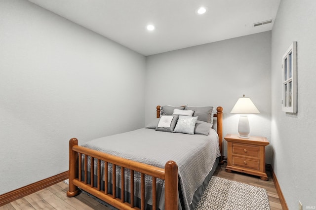 1208 Phaeton Way, Auburn, IN 46706 - bedroom with wood finished floors and recessed lighting