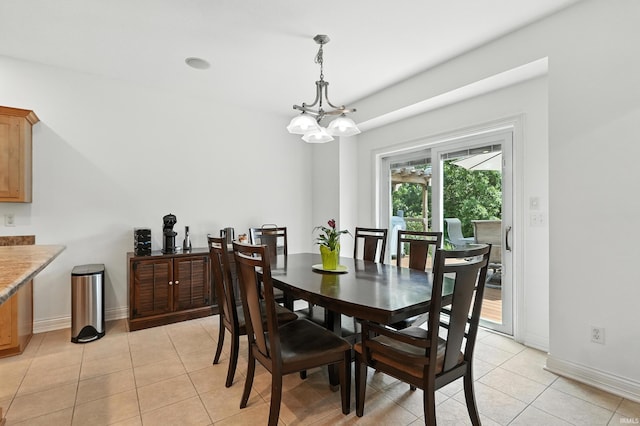 1208 Phaeton Way, Auburn, IN 46706 - dining room featuring light tile patterned floors and a chandelier