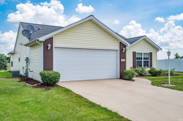 12909 Cocoplum Ct, Fort Wayne, IN 46814 - single story home with a garage, concrete driveway, brick siding, and roof with shingles