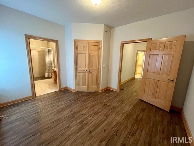 8018 Inverness Lakes Trl, Fort Wayne, IN 46804 - unfurnished room with wood finished floors and a textured ceiling