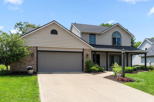 9628 Trading Post Rd, Leo, IN 46765 - traditional-style house with an attached garage, brick siding, concrete driveway, a front lawn, and a porch