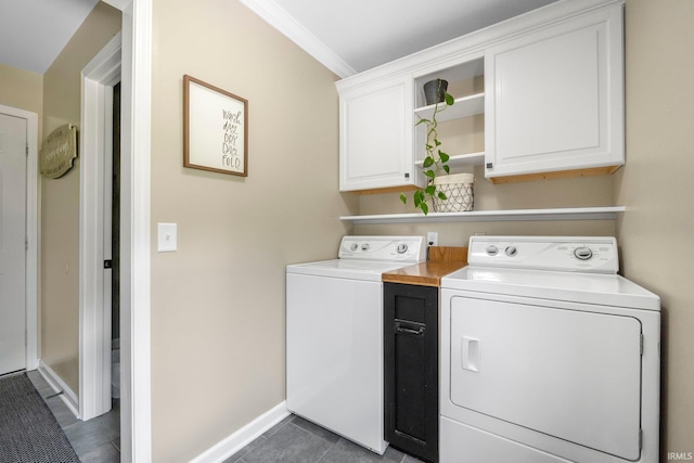 9628 Trading Post Rd, Leo, IN 46765 - laundry area featuring cabinet space, separate washer and dryer, tile patterned flooring, and crown molding