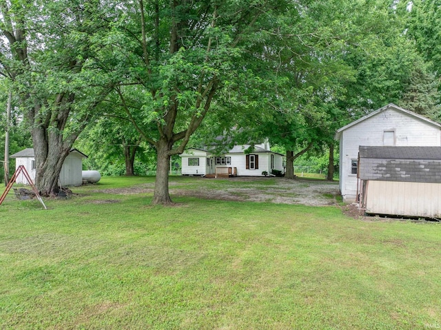12632 N 325 E, North Manchester, IN 46962 - view of green lawn with a storage shed