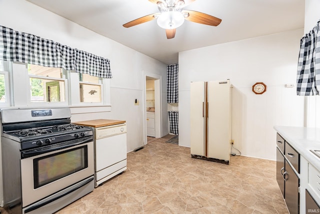 12632 N 325 E, North Manchester, IN 46962 - kitchen with white appliances, wooden counters, a ceiling fan, and white cabinets