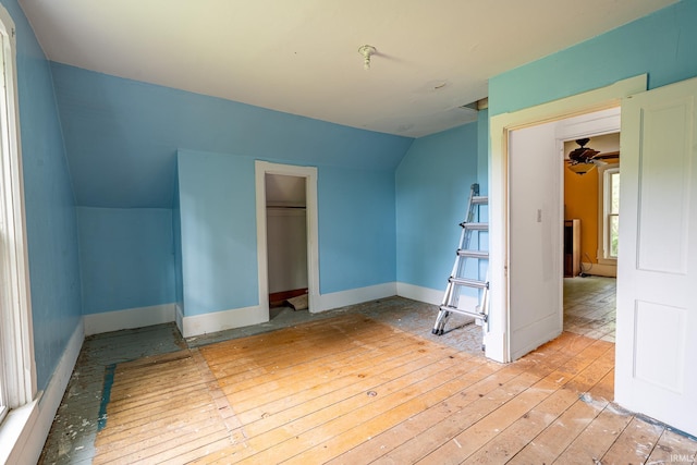 12632 N 325 E, North Manchester, IN 46962 - unfurnished bedroom with vaulted ceiling, hardwood / wood-style flooring, and a closet