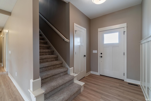 7751 Luna Way, Fort Wayne, IN 46835 - entryway featuring light wood-style floors and stairs