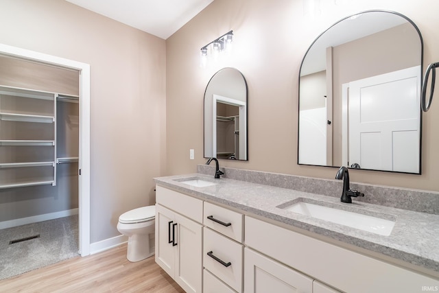 7751 Luna Way, Fort Wayne, IN 46835 - full bathroom with double vanity and wood finished floors