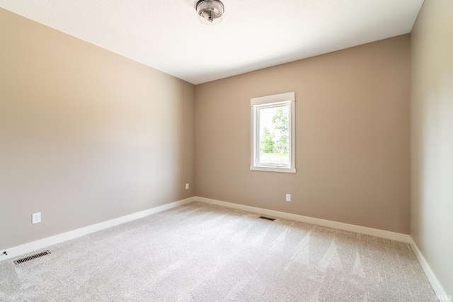7751 Luna Way, Fort Wayne, IN 46835 - spare room featuring light colored carpet and baseboards