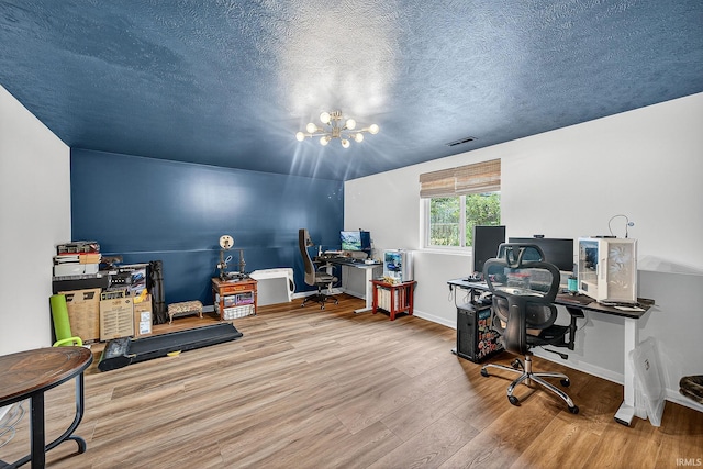 4343 Onyx Way S, Bend, IN 46628 - home office featuring wood finished floors, a chandelier, and a textured ceiling
