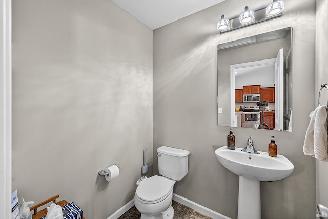 4343 Onyx Way S, Bend, IN 46628 - half bath featuring toilet and baseboards