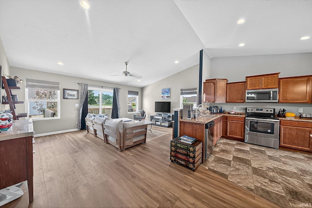 4343 Onyx Way S, Bend, IN 46628 - living area featuring ceiling fan, dark wood-style floors, high vaulted ceiling, and recessed lighting
