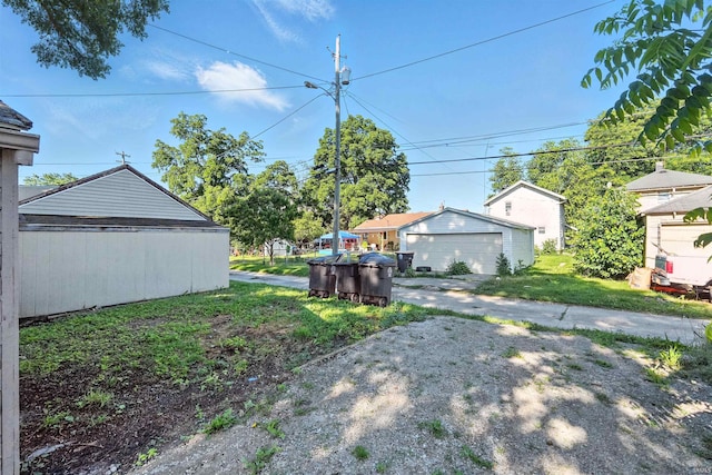 2020 Electric Ave, Fort Wayne, IN 46802 - view of yard featuring an outbuilding and a garage