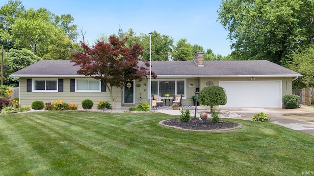 4831 Woodford Dr, Fort Wayne, IN 46835 - single story home featuring a chimney, an attached garage, and driveway