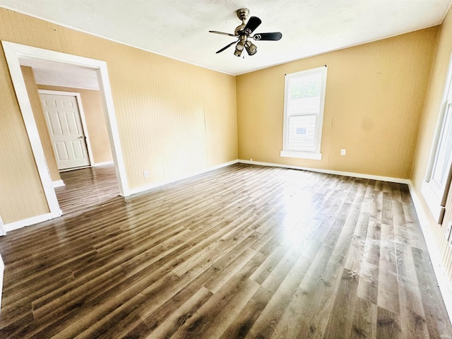 120 W Warren St, Mitchell, IN 47446 - spare room featuring wood finished floors and ceiling fan