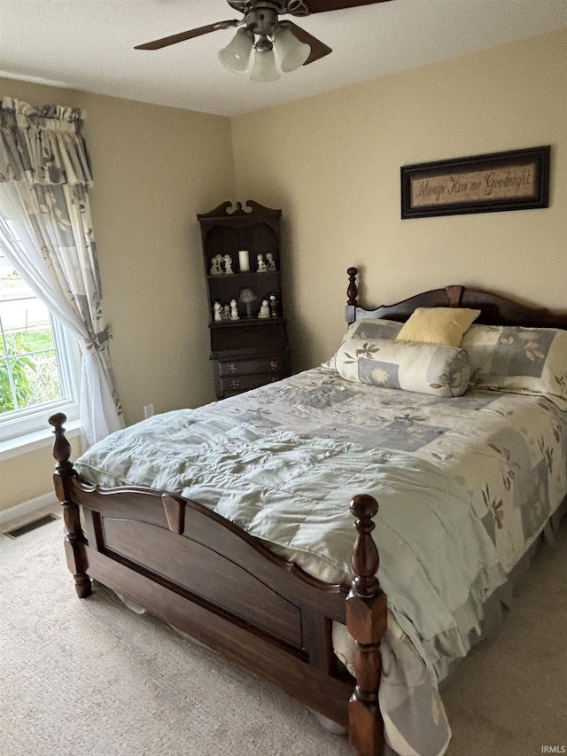 6933 Cleopatra Xing, Fort Wayne, IN 46818 - carpeted bedroom with a ceiling fan and baseboards