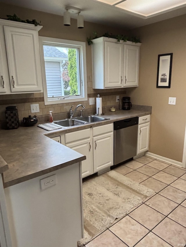 6933 Cleopatra Xing, Fort Wayne, IN 46818 - kitchen featuring dishwasher, decorative backsplash, and white cabinetry