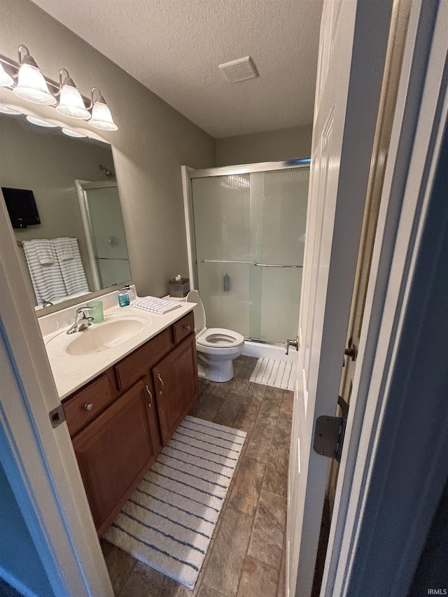 6933 Cleopatra Xing, Fort Wayne, IN 46818 - full bath featuring a stall shower, vanity, and a textured ceiling