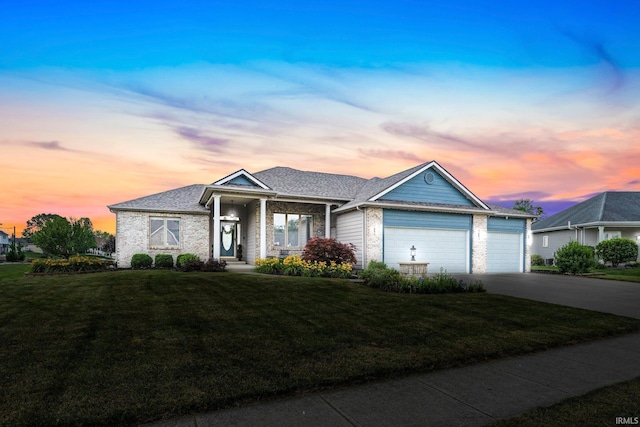 16619 Amethyst Pkwy, Fort Wayne, IN 46845 - ranch-style house with a front lawn, concrete driveway, and an attached garage